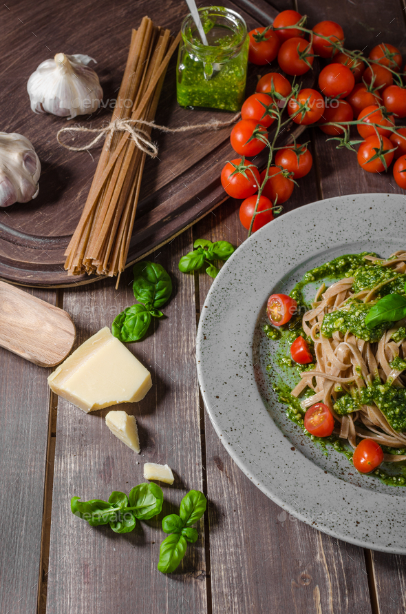 Pasta with basil pesto and parmesan Stock Photo by PeteerS PhotoDune